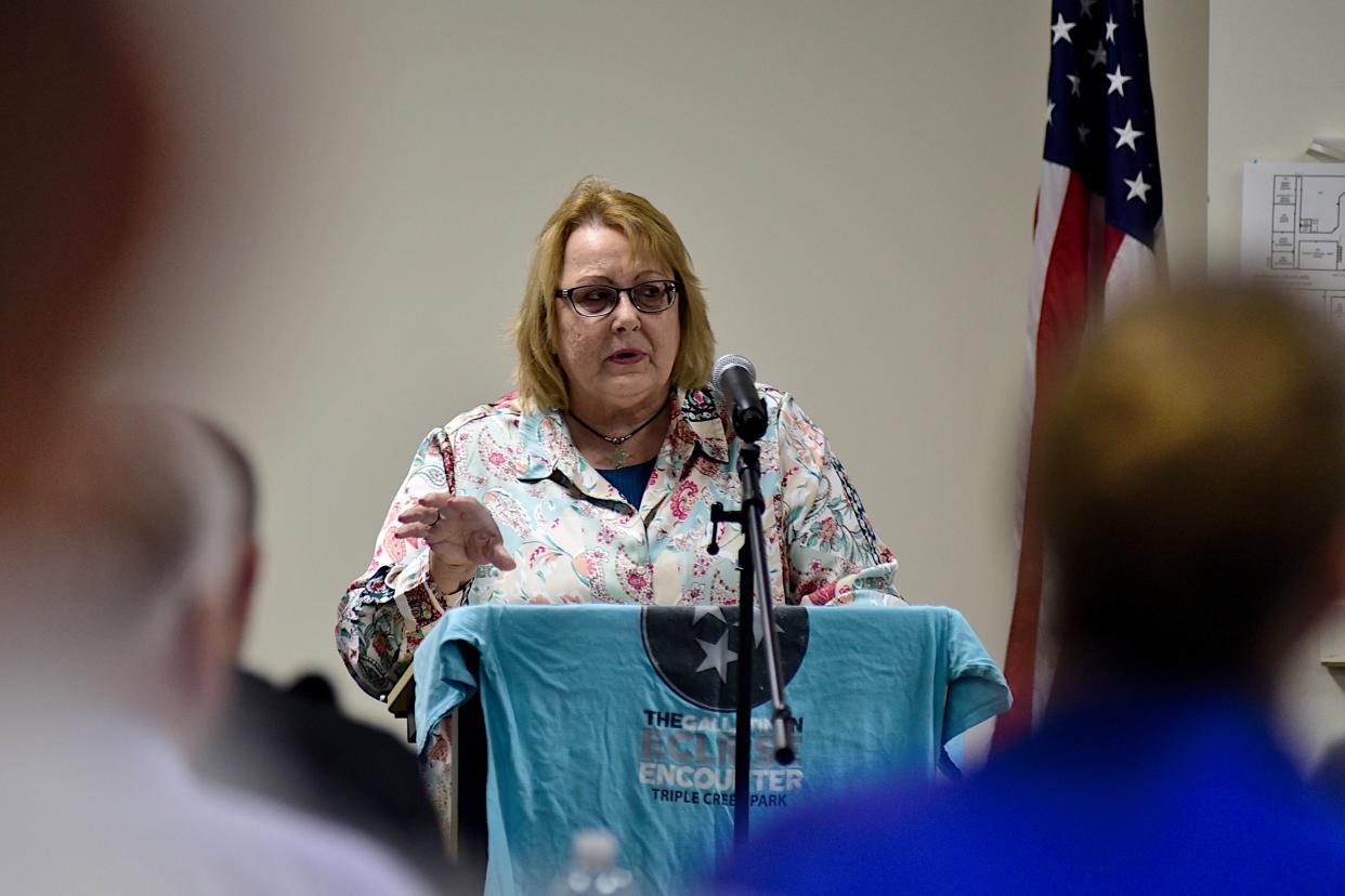 Deloris Mlay, president of the Richland Astronomy Society, explains to county leaders what they should expect during Ohio's total solar eclipse on April 8.