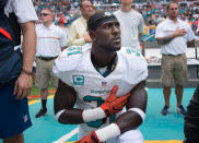 Miami Dolphins Safety Michael Thomas kneels during National Anthem at the game between the Cleveland Browns and the Miami Dolphins at Hard Rock Stadium in Miami Gardens, Fla. (Photo by Michele Eve Sandberg/Icon Sportswire via Getty Images)