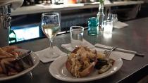 <p>The clam roll at<a href="http://littleneckbrooklyn.com/" rel="nofollow noopener" target="_blank" data-ylk="slk:Littleneck" class="link "> Littleneck </a>in Brooklyn is everything that a good New Englander could ever want from this genre of food. The clams are huge, succulent, and truly special, changing how you might feel about clams altogether. The lettuce is shredded romaine, the texture of which just feels right, and the tartar sauce is rich without being overwhelming. The bread comes from a bakery in Maine that supplies the clams, and is toasted to perfection. Littleneck in general is the sort of place that makes a customer feel taken care of, and their roll is the ideal example of that, hitting all the high notes that a seafood sandwich should hit.</p><p><i>(Photo Courtesy of Littleneck)</i></p>