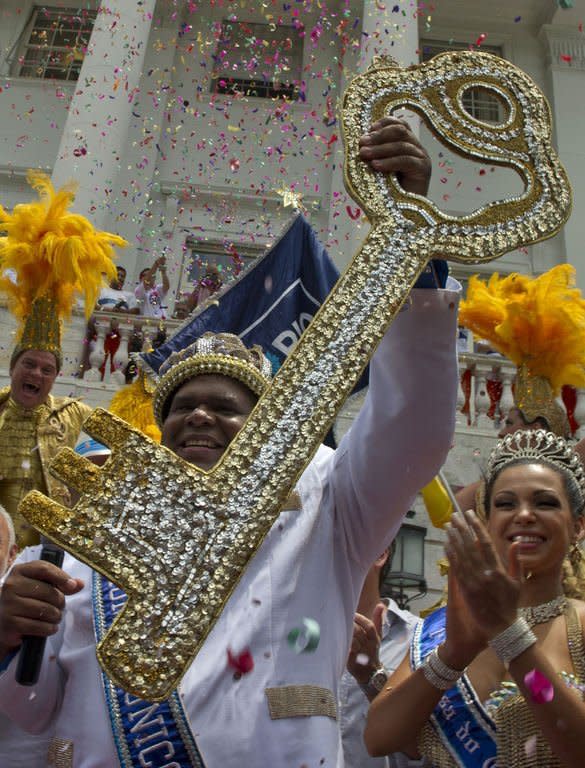 King Momo holds the key of Rio de Janeiro after receiving it from Rio's Mayor Eduardo Paes and thus officially opens the city's world famous carnival on February 8, 2013. The 150-kilogram Milton Rodrigues da Silva, the event's undisputed king for the past five years in a row, kicked off five days of nonstop partying in Brazil's Marvelous City, Rio