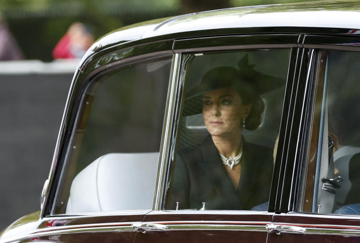 Catherine, Princess of Wales, wore pearl earrings and the Queen's pearl necklace for the late monarch's funeral. (Reuters)