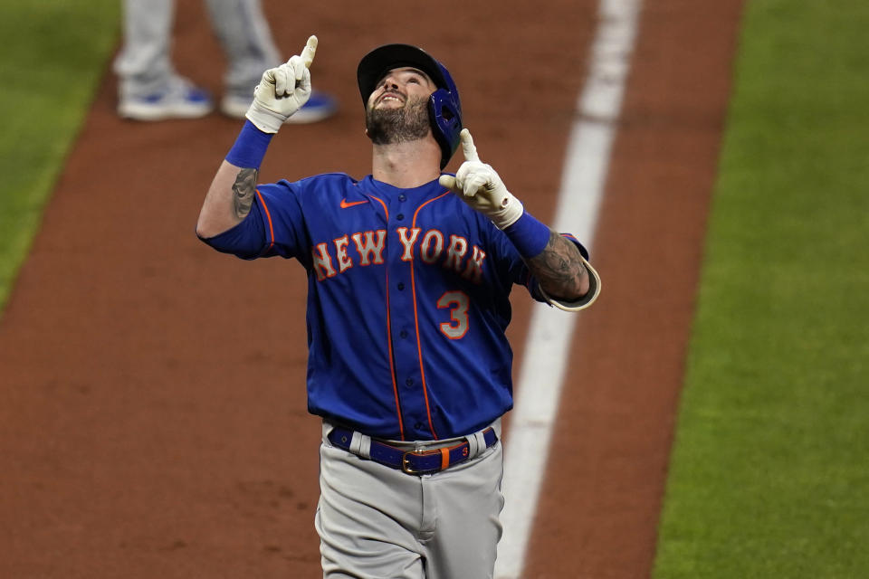 New York Mets' Tomas Nido celebrates after hitting a two-run home run during the second inning in the second game of a baseball doubleheader against the St. Louis Cardinals Wednesday, May 5, 2021, in St. Louis. (AP Photo/Jeff Roberson)