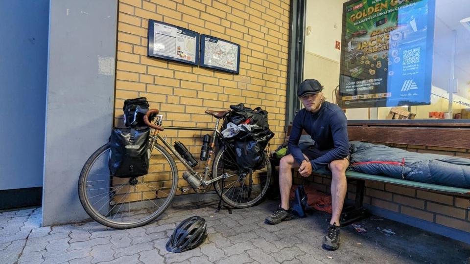 Jamie at a camp outside a supermarket