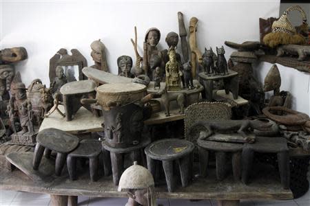 Wood carvings are arranged in the art gallery of Nigerian artist and designer Nike Davies-Okundaye in Lagos' Lekki district August 30, 2013. REUTERS/Akintunde Akinleye