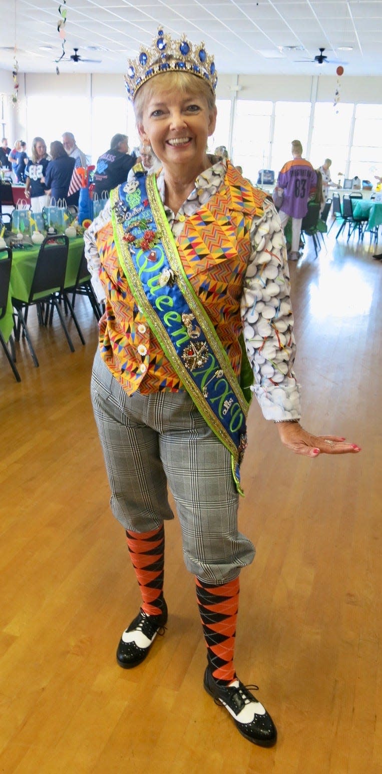 Golf, anyone? In keeping with the Krewe of Elders coronation theme "Sports Spectrum", Elders XXV Queen Janie Hudson is fashionable chic at the August 2023 event.
