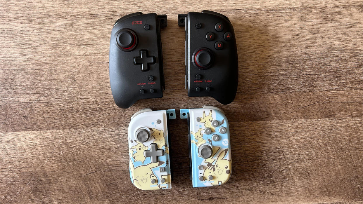  Hori Split Pad Pro and Hori Split Pad Compact on a wooden table 