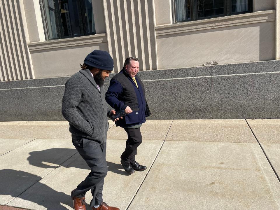 Douglas Donley, left, leaves the federal courthouse in downtown South Bend on Nov. 1, 2023, after being found guilty for his role in a conspiracy to steal money from the housing authority. Donley ran D. Fresh Contractors, which fraudulently accepted payments for repairs, a jury found.