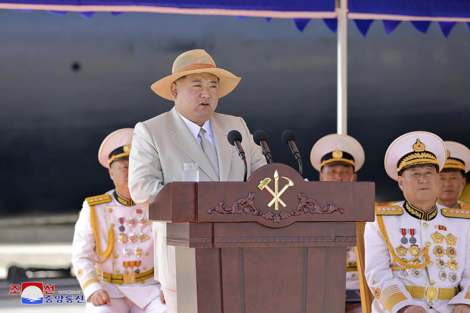 In this photo provided by the North Korean government, North Korea leader Kim Jong Un delivers a speech during a launching ceremony of what is says a new nuclear attack submarine "Hero Kim Kun Ok" at an unspecified place in North Korea Wednesday, Sept. 6, 2023. Independent journalists were not given access to cover the event depicted in this image distributed by the North Korean government. The content of this image is as provided and cannot be independently verified. Korean language watermark on image as provided by source reads: "KCNA" which is the abbreviation for Korean Central News Agency. (Korean Central News Agency/Korea News Service via AP)