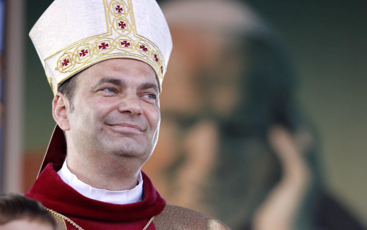 Grzegorz Kaszak, bishop of the diocese of Sosnowiec looks on during 10th anniversary of late pope John Paul II's visit in Sosnowiec, Poland, June 14, 2009