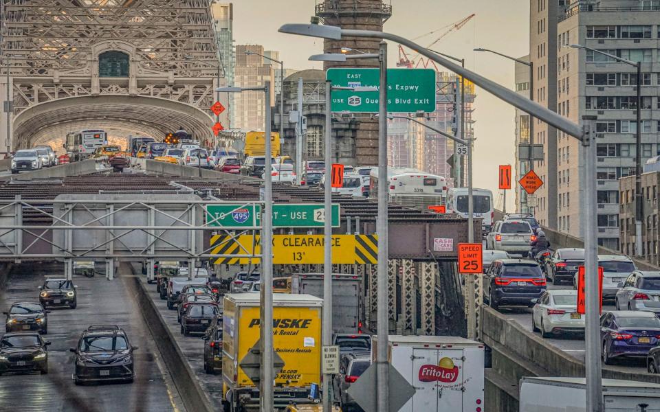 Traffic enters and leaves mid-town Manhattan via the Queensboro Bridge