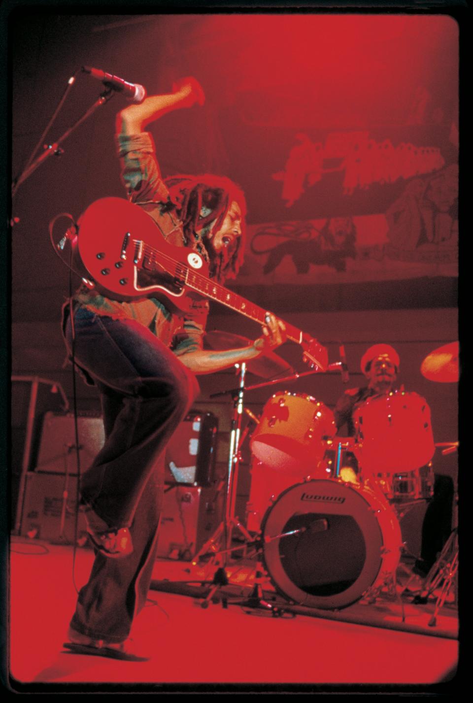 Marley's intense and electric nature is captured in this concert photo by Kate Simon, whose 400-plus shots in "Rebel Music: Bob Marley & Roots Reggae" focus on her five years with the reggae legend, who died at 36 in 1981.