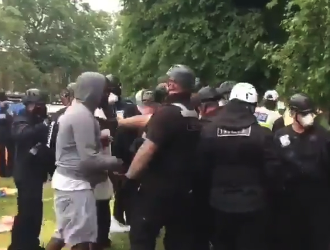 Bailiffs and riot police clear anti-lockdown protesters from ‘Lovedown camp’ at Shepherd’s Bush Green (Screengrab from Twitter)