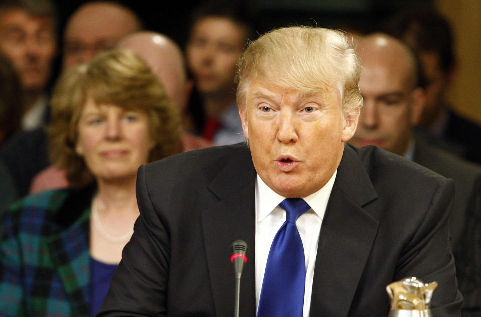 In this photo released by the Scottish Parliament dated Wednesday April 25, 2012, Trump gives evidence to the Scottish Parliament's Economy Energy and Tourism Committee in Edinburgh, Scotland.   (AP Photo/Andrew Cowan/Scottish Parliament) 