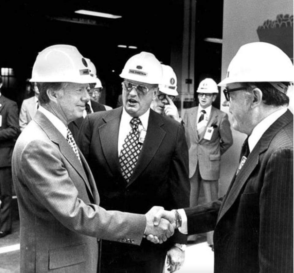 President Jimmy Carter, from left, Paul Vanstrum, and Bill Wilcox as Vanstrum introduces the president to Bill Wilcox who would lead the tour at K-25 in May 1978.