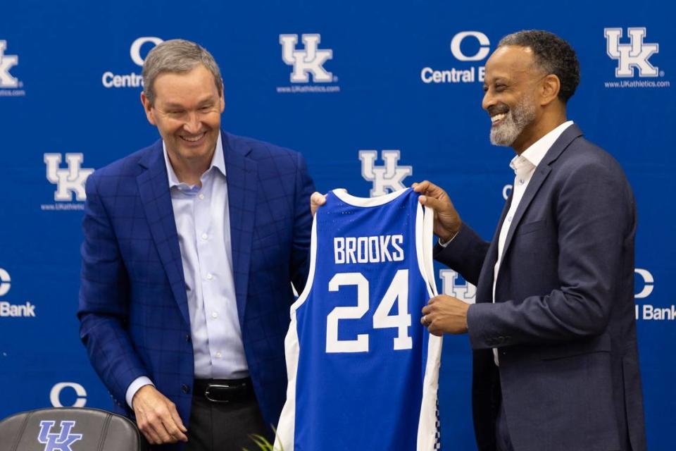 New Kentucky women’s basketball head coach Kenny Brooks, right, went 8-4 vs. SEC teams during his tenure (2016 through 2024) as Virginia Tech head man.