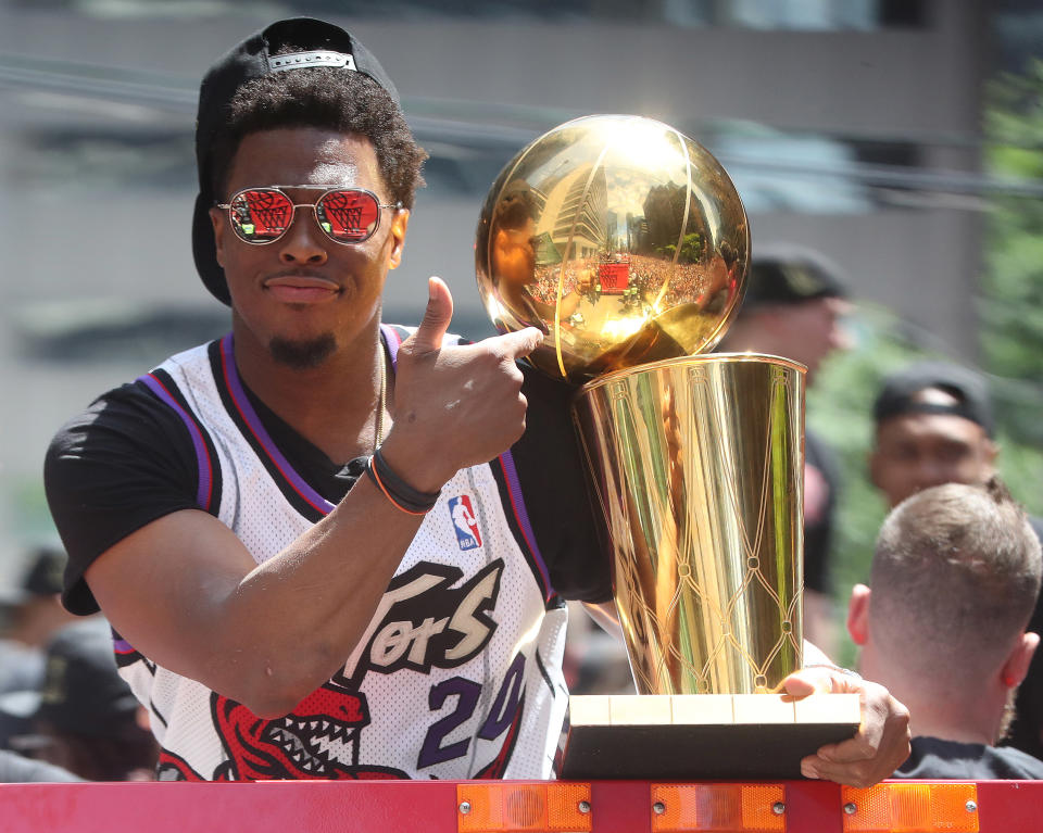 TORONTO, ON- JUNE 17  -  Kyle Lowry with the Larry O'Brien NBA Championship Trophy as the Toronto Raptors hold their victory parade after beating the Golden State Warriors in the NBA Finals  in Toronto. June 17, 2019.        (Steve Russell/Toronto Star via Getty Images)