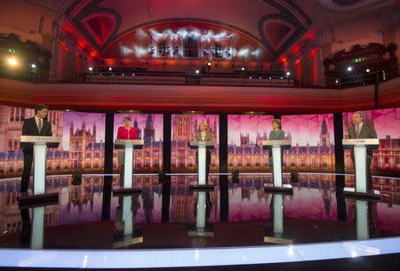 (L-R) Britain's opposition Labour Party leader Ed Miliband, Plaid Cymru leader Leanne Wood, Green Party leader Natalie Bennett, SNP leader Nicola Sturgeon and UKIP leader Nigel Farage participate in the televised leaders' debate in London, April 16, 2015. REUTERS/Stefan Rousseau/Pool