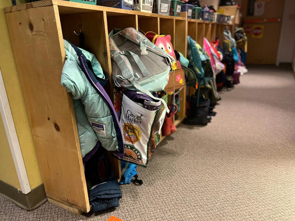 A row of backpacks and coats at Pine Forest Children's Center in Burlington on March 7, 2022.