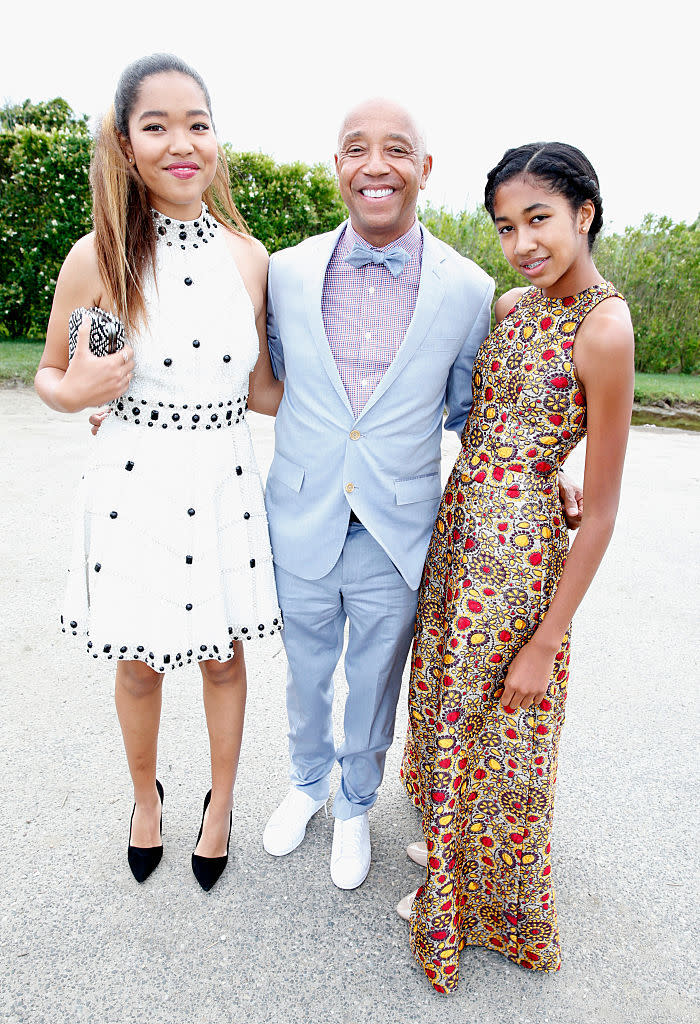 Russell Simmons, center, freaked out when he saw his 16-year-old daughter, Ming Lee Simmons, left, wear high heels. Also pictured, his other daughter, 13-year-old Aoki Lee Simmons. (Photo: Getty Images)