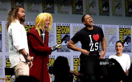 Cast members (L-R) Jason Momoa, Ezra Miller, Ray Fisher and Gal Gadot at a panel for "Justice League" during the 2017 Comic-Con International Convention in San Diego, California, U.S., July 22, 2017. REUTERS/Mario Anzuoni