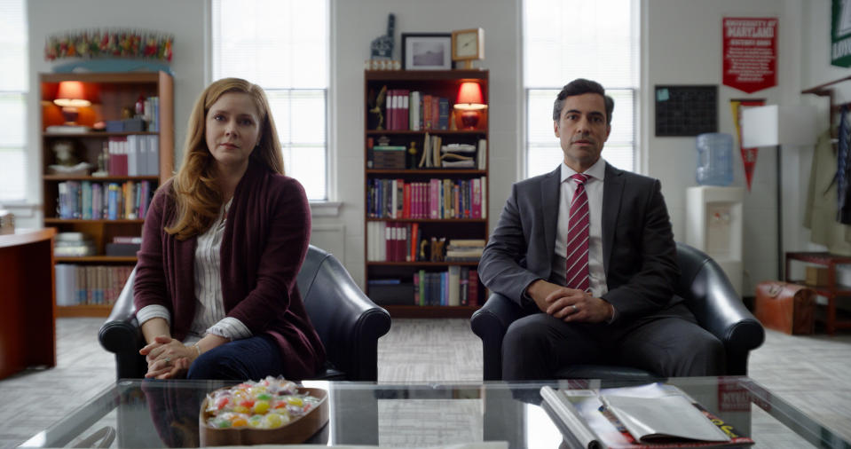 This mage released by Universal Pictures shows Amy Adams, left, and Danny Pino in a scene from "Dear Evan Hansen." (Universal Pictures via AP)