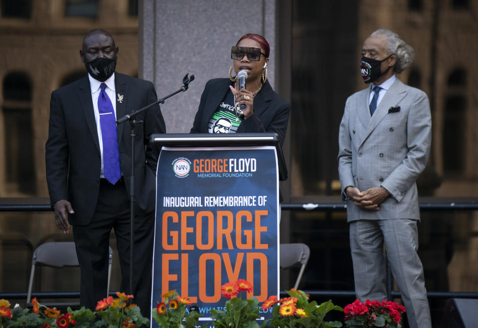 George Floyd's sister, Bridgett Floyd, addresses a rally in downtown Minneapolis, Sunday, May 23, 2021. At left is attorney Ben Crump. At right is the Rev. Al Sharpton. “It has been a long year. It has been a painful year,” Floyd's sister Bridgett told the crowd on Sunday.(Jeff Wheeler/Star Tribune via AP)