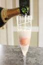 <p>Add a scoop of fruit sorbet to the flute before pouring for a sweet bubbly treat. </p><p><strong>Get the recipe at <a rel="nofollow noopener" href="http://whilewearingheels.blogspot.com/2013/04/champagne-floats.html" target="_blank" data-ylk="slk:While Wearing Heels;elm:context_link;itc:0;sec:content-canvas" class="link ">While Wearing Heels</a>.</strong></p>