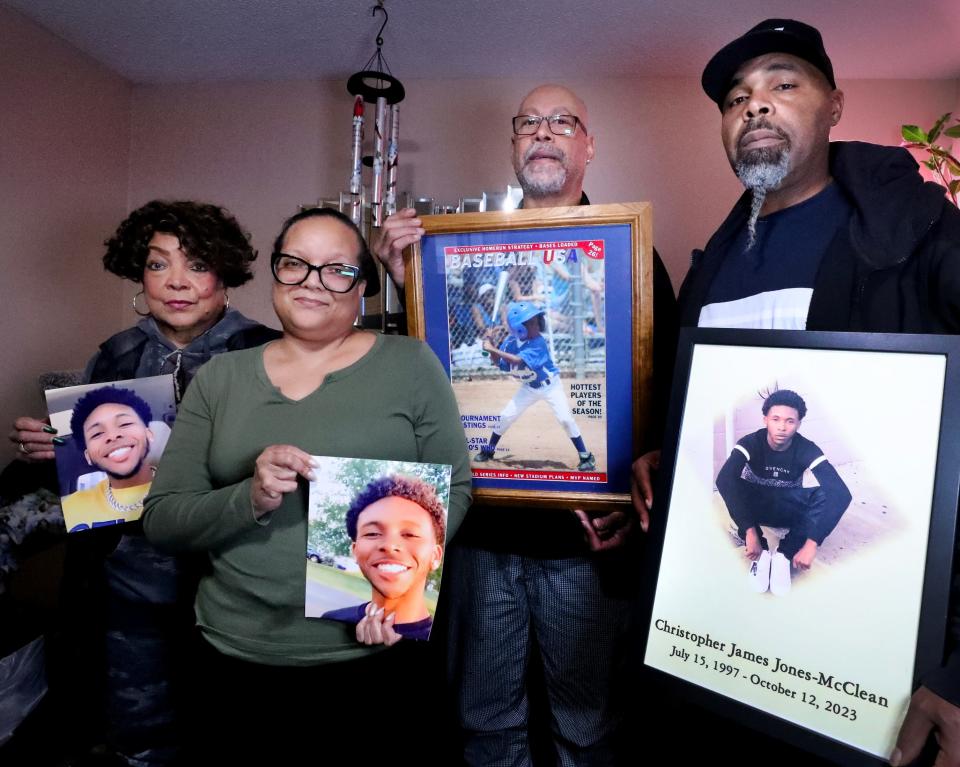 The family of Christopher Jones-McClean hold up images of him throughout his life after asking the community for answers about the death of Jones-McClean. Left to right grandmother Pam Martin ( Kim Thompson's mother), mother Kim Thompson, step father Antonio Thompson and father Rico McClean, at the Thompson's home in Shelbyville, on Wednesday, Jan. 24, 2024.