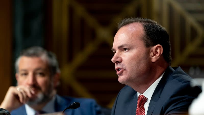 Sen. Ted Cruz, R-Texas, listens as Sen. Mike Lee, R-Utah, speaks during a Senate Judiciary Committee Hearing on Capitol Hill in Washington, Tuesday, July 12, 2022.