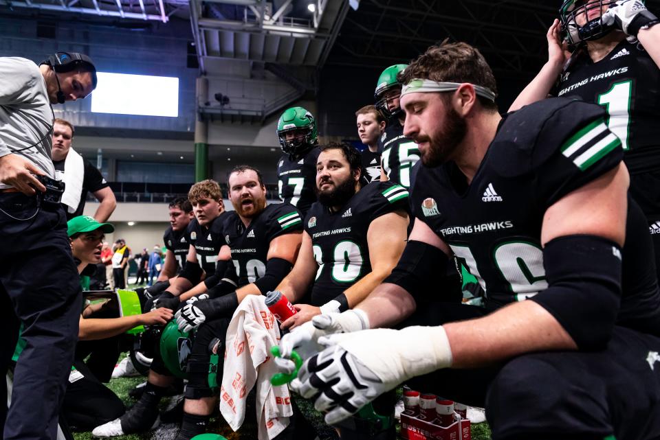 North Dakota senior Matt Waletkzo sits in a huddle during the game against North Dakota State Saturday, Oct. 2, 2021, at the Alerus Center in Grand Forks.