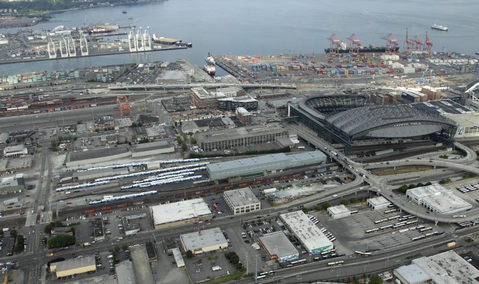 In this aerial photo taken Aug. 21, 2012, Safeco Field is shown near downtown Seattle and the Port of Seattle. A new arena in Seattle that would be built just south of Safeco Field and that could bring NBA basketball back to the city appeared a step closer to reality as Seattle Mayor Mike McGinn issued a statement late Monday, Sept. 10, 2012, saying he welcomes the news that the Seattle City Council has decided to support bringing basketball back to Seattle. (AP Photo/Ted S. Warren)