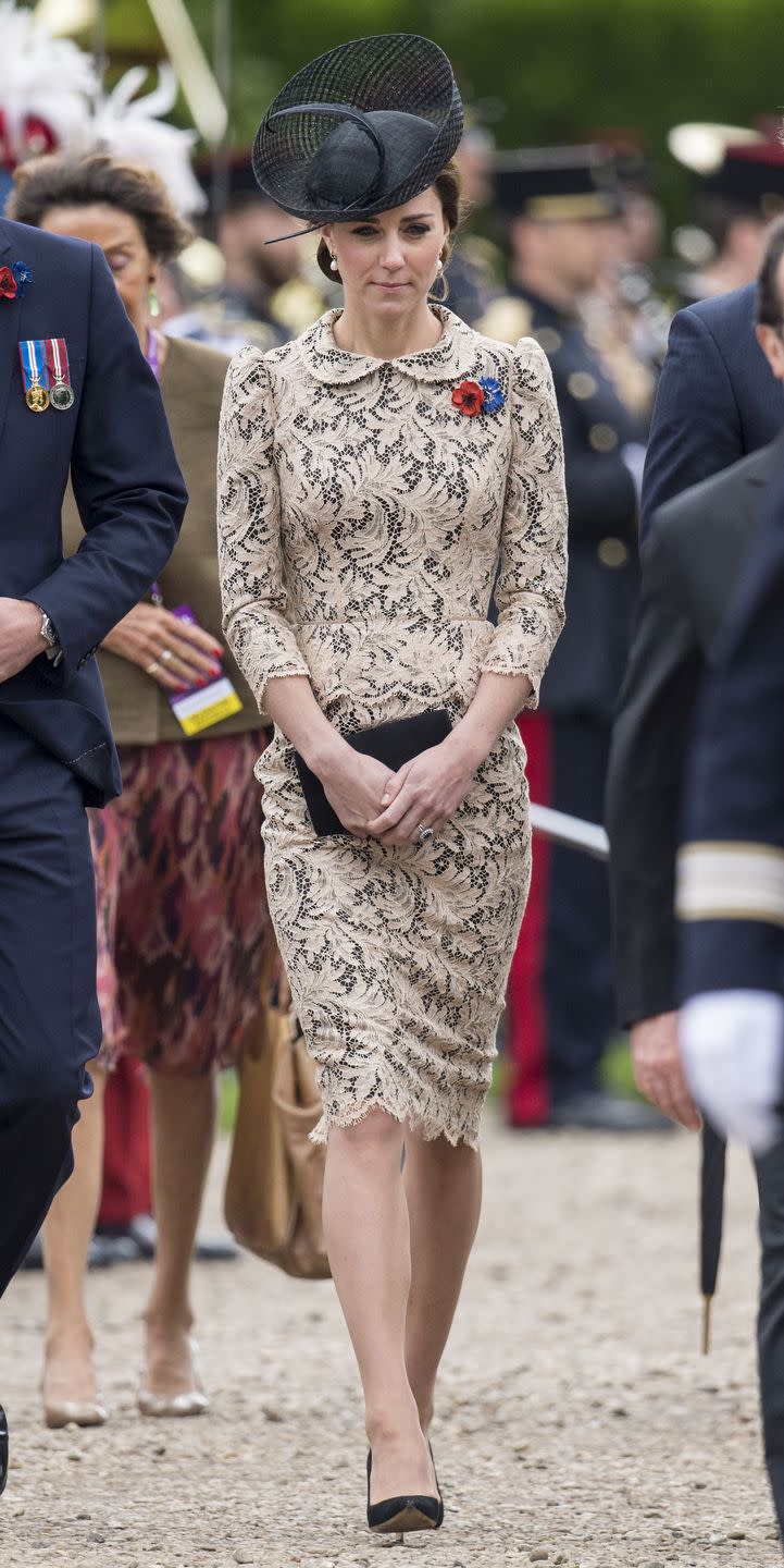 <p>Kate Middleton wears a white lace peplum dress with a scalloped hem, a hat by Lock & Co, black clutch and black pumps at the Somme Centenary Commemorations in France.</p>