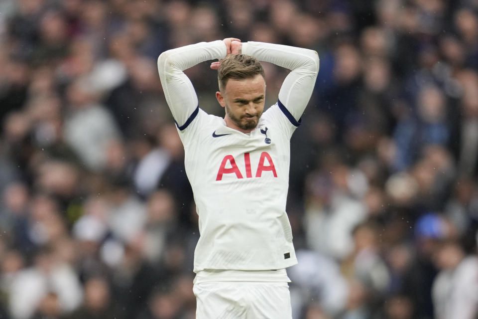 Tottenham's James Maddison is disappointed after Micky van de Ven's goal was disallowed for offside after VAR examination during the English Premier League soccer match between Tottenham Hotspur and Arsenal at the Tottenham Hotspur Stadium in London, England, Sunday, April 28, 2024. (AP Photo/Kin Cheung)