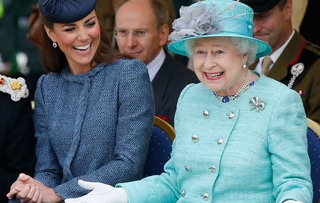 The Queen spotted goofing around with Kate Middleton. Source: Getty