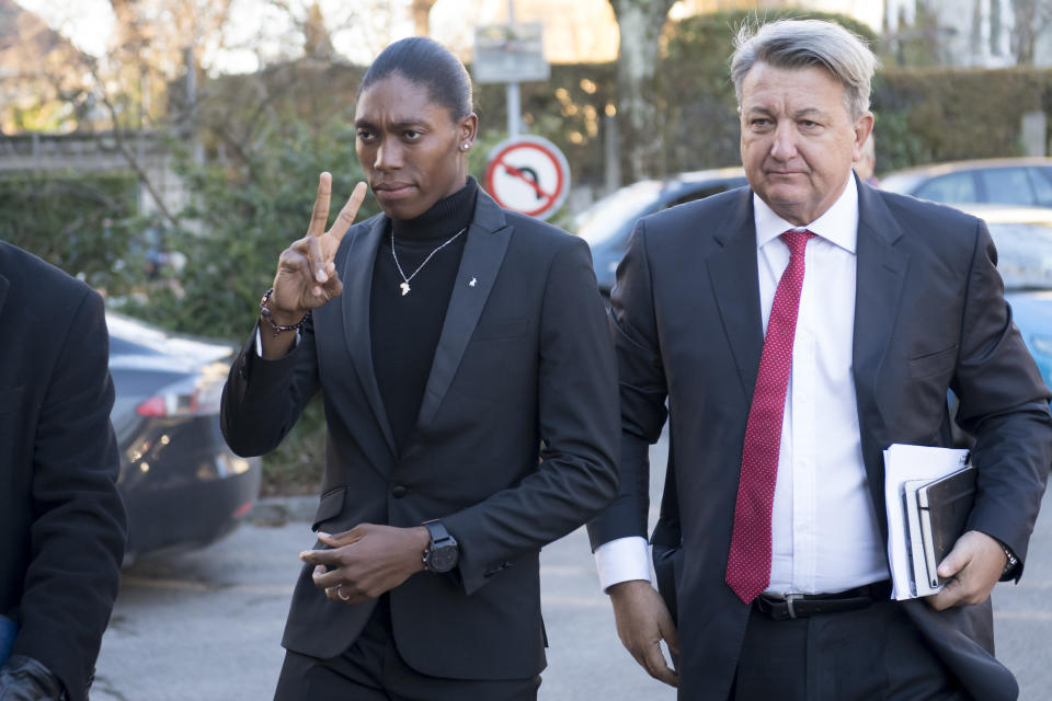 FILE - In this Monday, Feb. 18, 2019 file photo, South Africa's runner Caster Semenya, left, and her lawyer Gregory Nott, right, arrive for the first day of a hearing at the international Court of Arbitration for Sport, CAS, in Lausanne, Switzerland. The European Court of Human Rights is expected to deliver what could be the final word Tuesday in Olympic champion runner Caster Semenya's yearslong legal challenge against rules that force her and other female athletes to lower their natural hormone levels through medical intervention to be allowed to compete in women's track and field races. (Laurent Gillieron/Keystone via AP, File)