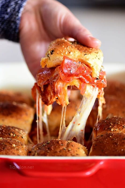 <p>Tidymom</p><p><strong>Recipe: <a href="https://tidymom.net/2020/pepperoni-pizza-sliders/" rel="nofollow noopener" target="_blank" data-ylk="slk:Pepperoni Pizza Sliders;elm:context_link;itc:0;sec:content-canvas" class="link ">Pepperoni Pizza Sliders</a></strong></p>