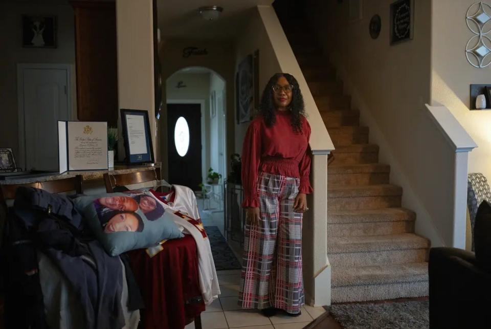 Carla Gates at her home in Lancaster on Dec. 21. Her husband, Eugene Gates Jr., died while delivering mail in June 2023. Gates was a U.S. Postal Service mail carrier for more than 30 years and loved the people on his route, Carla said.