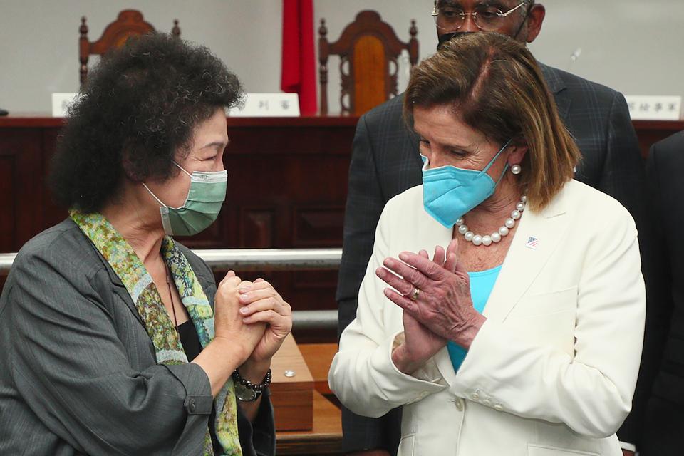 US House Speaker Nancy Pelosi at reacts to Chen Chu, the President of the Control Yuan and Chair of the National Human Rights Commission, during a visit to a human rights museum in Taipei, Taiwan (AP)