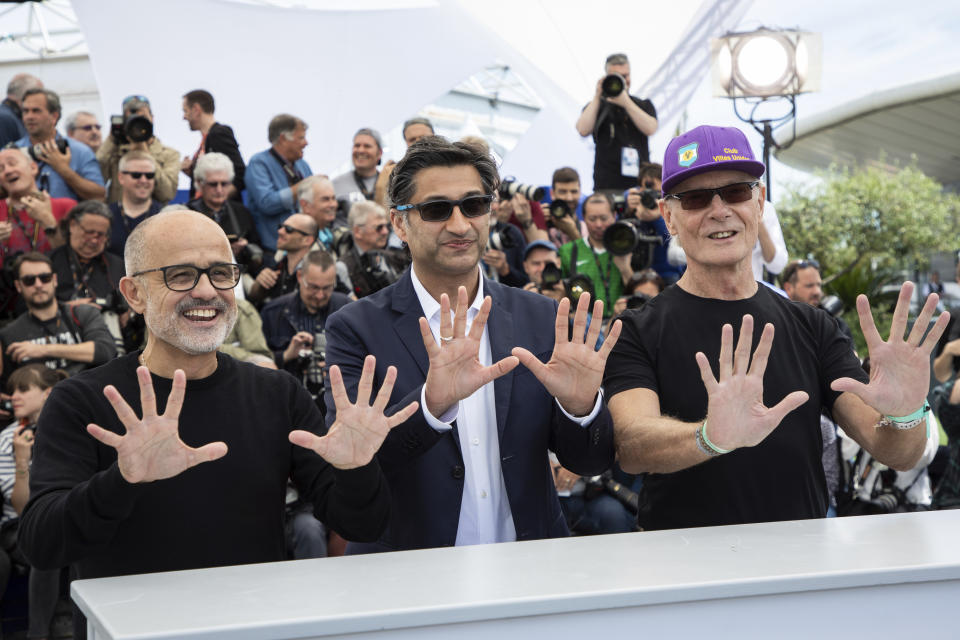 Producer Daniel Arcucci, from left director Asif Kapadia and Fernando Signorini pose for photographers at the photo call for the film 'Diego Maradona' at the 72nd international film festival, Cannes, southern France, Monday, May 20, 2019. (Photo by Vianney Le Caer/Invision/AP)