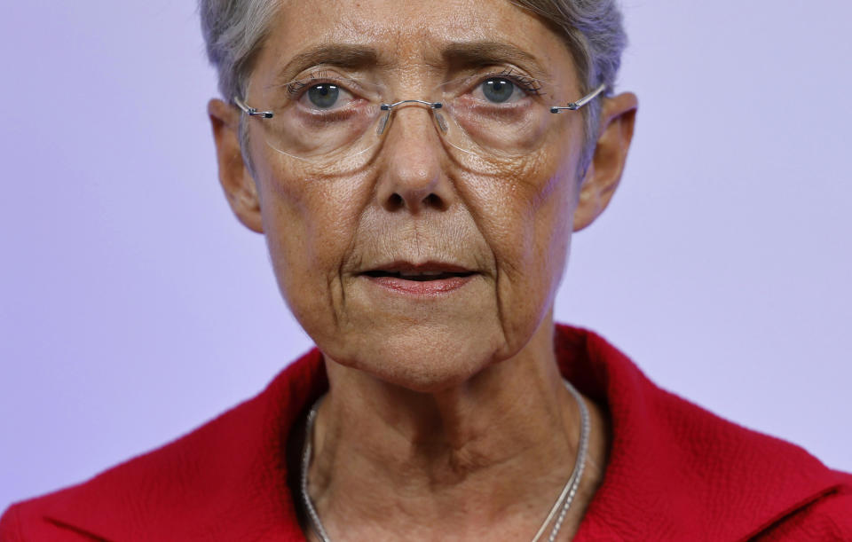 France's Prime Minister Elisabeth Borne gives a speech in Paris Sunday June 19, 2022. French President Emmanuel Macron's centrist alliance was projected to lose its majority despite getting the most seats in the final round of the parliamentary election Sunday, while the far-right National Rally appeared to have made big gains. A new coalition — made up of the hard left, the Socialists and the Greens — is projected to become the main opposition force with about 150 to 200 seats of the 577 members of the National Assembly. (Ludovic Marin, Pool via AP)