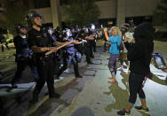 Aug 23, 2020; Kenosha, WI, USA; Police in riot gear move protestors back outside the Kenosha Police Department in Kenosha on Sunday, Aug. 23, 2020. Kenosha police shot a man Sunday evening, setting off unrest in the city after a video appeared to show the officer firing several shots at close range into the man's back. Mandatory Credit: Mike De Sisti/Milwaukee Journal Sentinel via USA TODAY NETWORK/Sipa USA