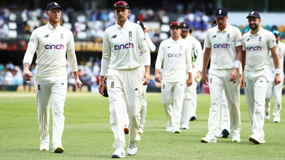 Joe Root and England teammates, pictured here leaving the field after the first Ashes Test.