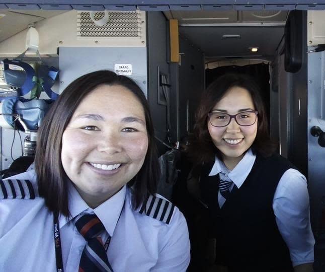 Melissa Haney and Zoe Kroonenburg pictured in 2016 when Haney was a pilot and Kroonenburg a flight attendant.