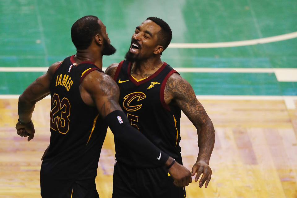 J.R. Smith, right, celebrates a playoff victory in 2018 with LeBron James. (Photo: Adam Glanzman via Getty Images)