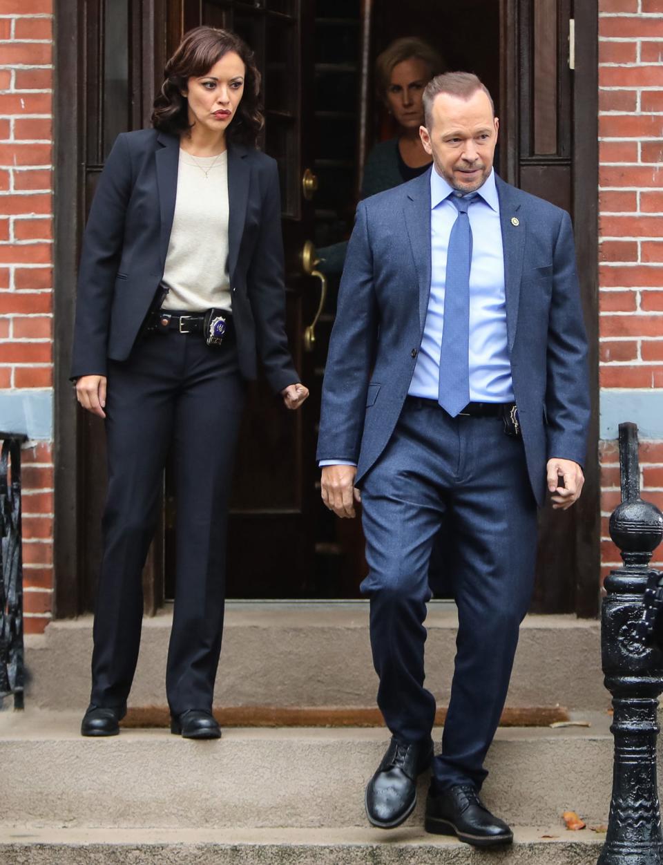 <p>Marisa Ramirez and Donnie Wahlberg are seen on the set of <i>Blue Bloods</i> on Monday in N.Y.C. </p>