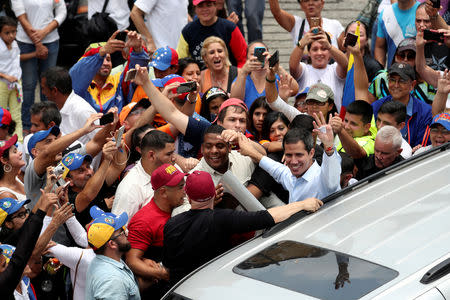 Venezuelan opposition leader Juan Guaido, who many nations have recognised as the country's rightful interim ruler, attends a rally in Carrizal, Venezuela, March 30, 2019. REUTERS/Ivan Alvarado