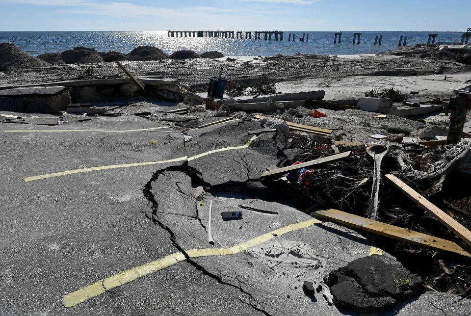 While daily cleanup continues nearly one month after Hurricane Ian's destruction on Fort Myers Beach's Estero Island, some buildings, boats and homes still look the same the day after landfall.