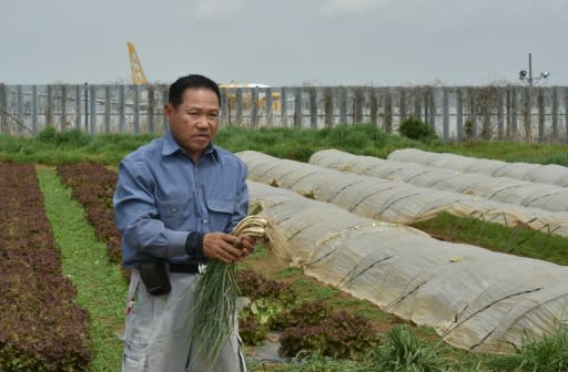 Japanese farmer Takao Shito says he is happy on the land and has some 400 clients in and around Tokyo who buy his organic produce