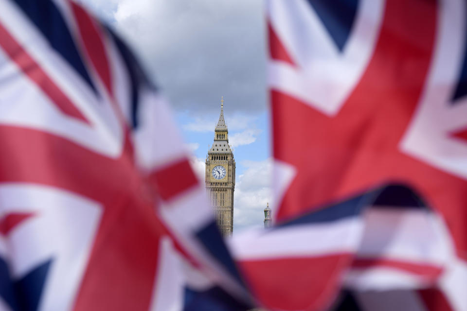 Union Jack flags are seen surrounding the Elizabeth Tower, known as Big Ben, beside the Houses of Parliament in London, Friday, June 24, 2022. British Prime Minister Boris Johnson suffered a double blow as voters rejected his Conservative Party in two special elections dominated by questions about his leadership and ethics. He was further wounded when the party's chairman quit after the results came out early Friday, saying Conservatives “cannot carry on with business as usual.” (AP Photo/Frank Augstein)