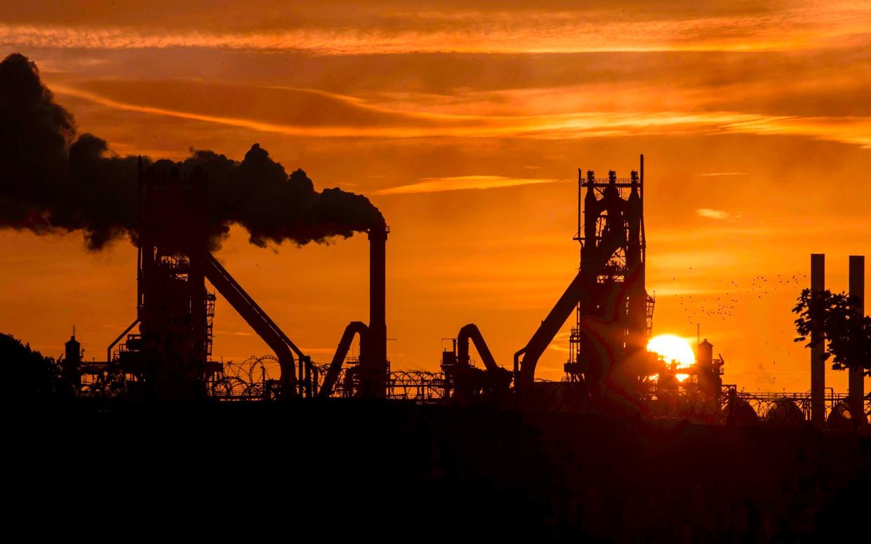 In this file photo taken on September 28, 2016 The sun rises behind the British Steel - Scunthorpe plant in north Lincolnshire, north east England on September 28, 2016. (Photo by Lindsey Parnaby / AFP)LINDSEY PARNABY/AFP/Getty Images